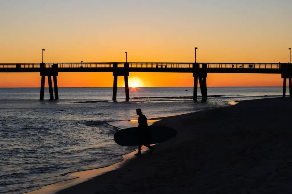 Paddle Boarding At Sunrise